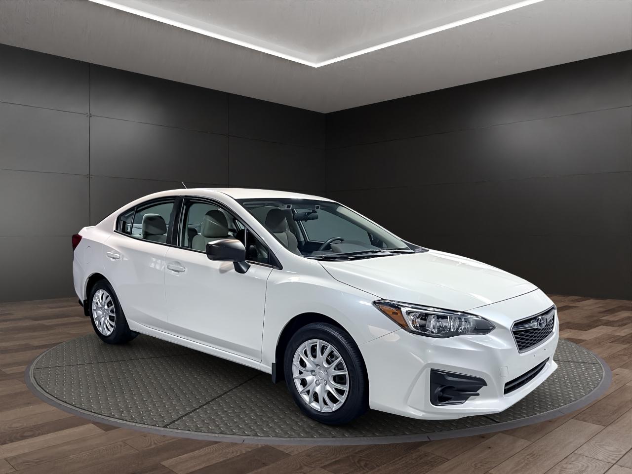 Subaru Impreza 2.0i 4-door CVT 2019