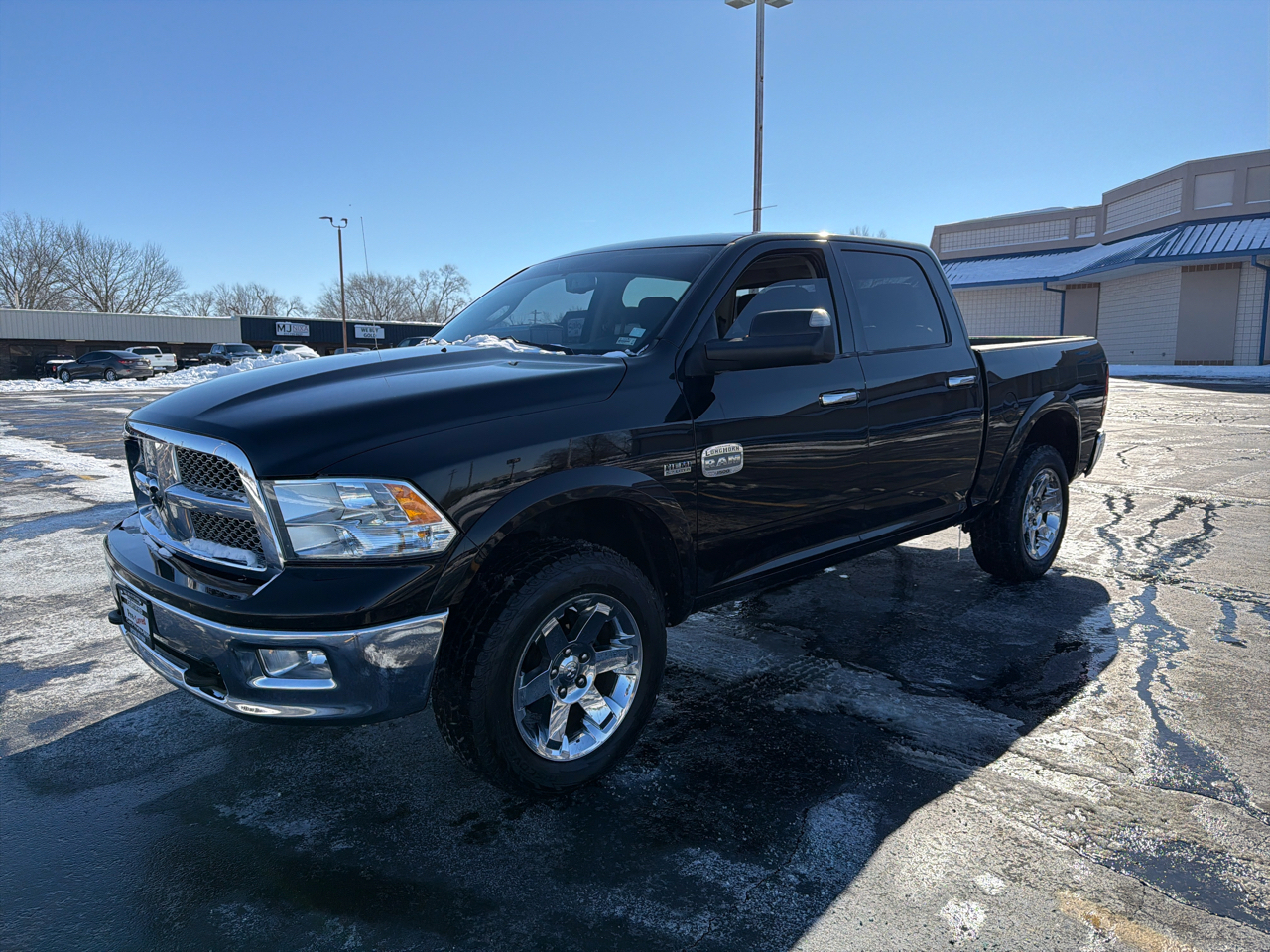 2012 RAM 1500 4WD Crew Cab 140.5" Laramie Longhorn Edition