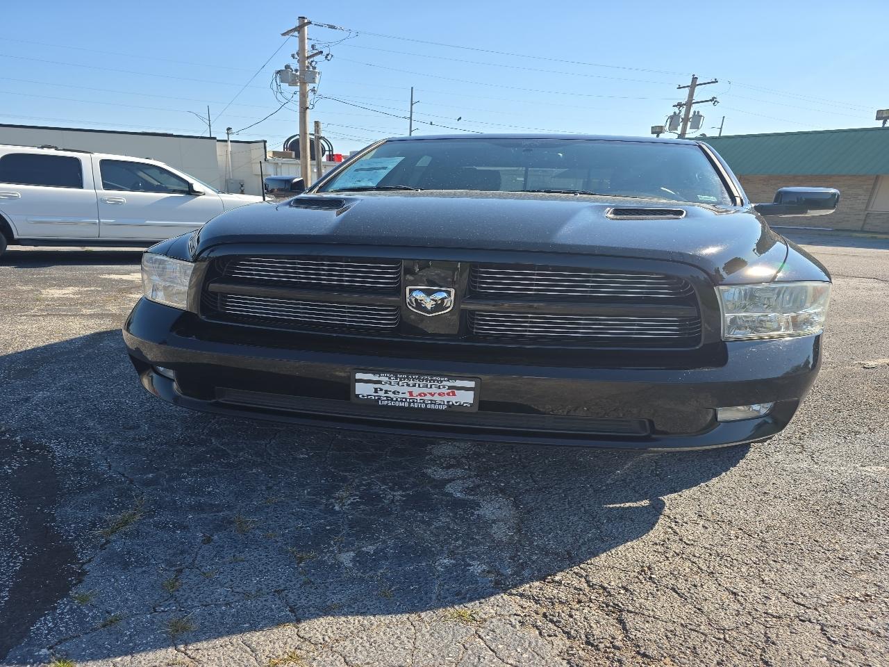 2012 RAM 1500 4WD Crew Cab 140.5" Sport