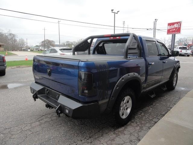 RAM 1500 4WD Crew Cab 140.5" Outdoorsman 2011