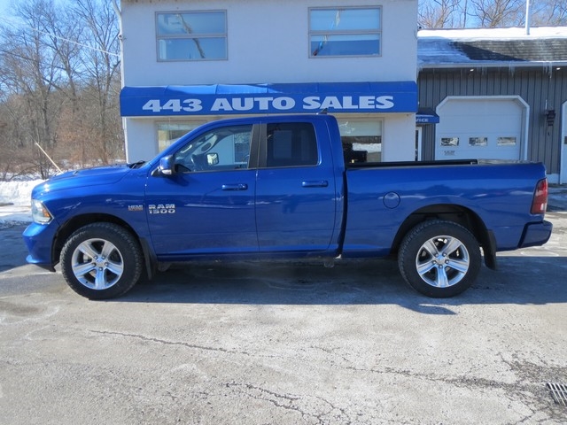 RAM 1500 4WD Quad Cab 140.5" Sport 2014