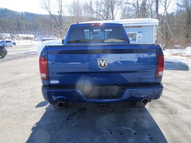 RAM 1500 4WD Quad Cab 140.5" Sport 2014