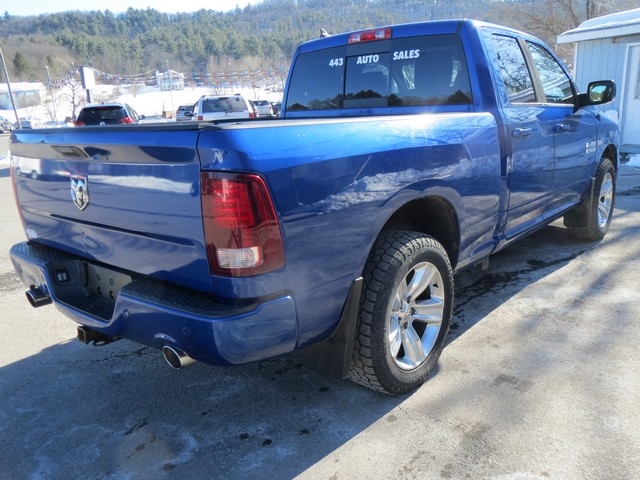RAM 1500 4WD Quad Cab 140.5" Sport 2014