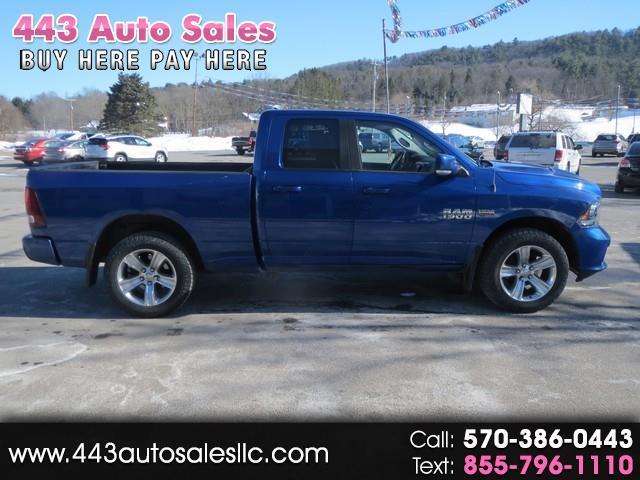2014 RAM 1500 4WD Quad Cab 140.5" Sport