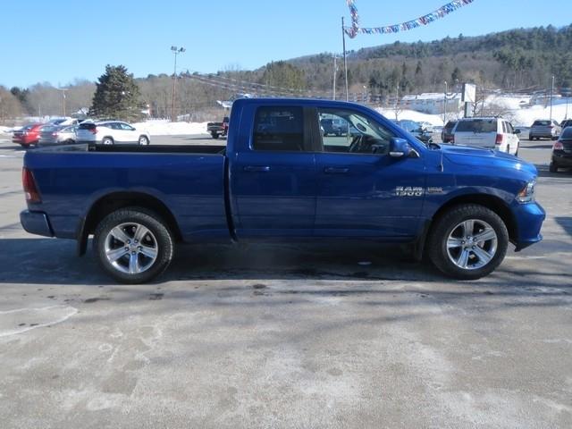 RAM 1500 4WD Quad Cab 140.5" Sport 2014