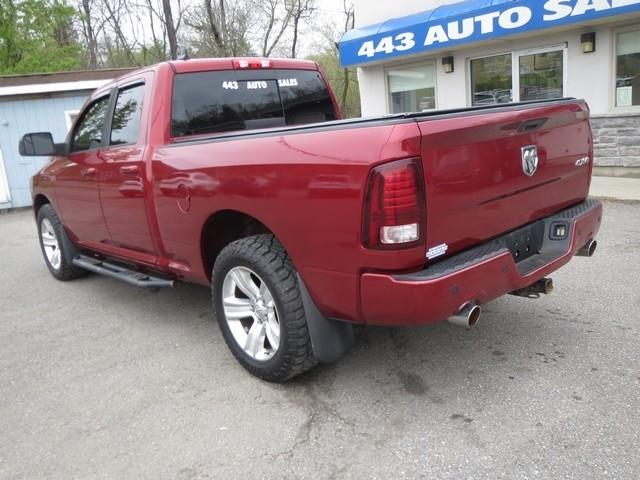 RAM 1500 4WD Quad Cab 140.5" Sport 2013
