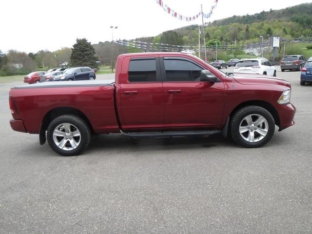RAM 1500 4WD Quad Cab 140.5" Sport 2013