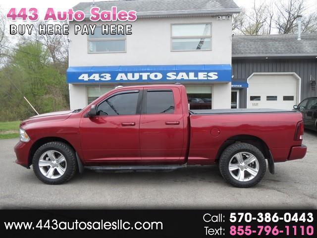 2013 RAM 1500 4WD Quad Cab 140.5" Sport