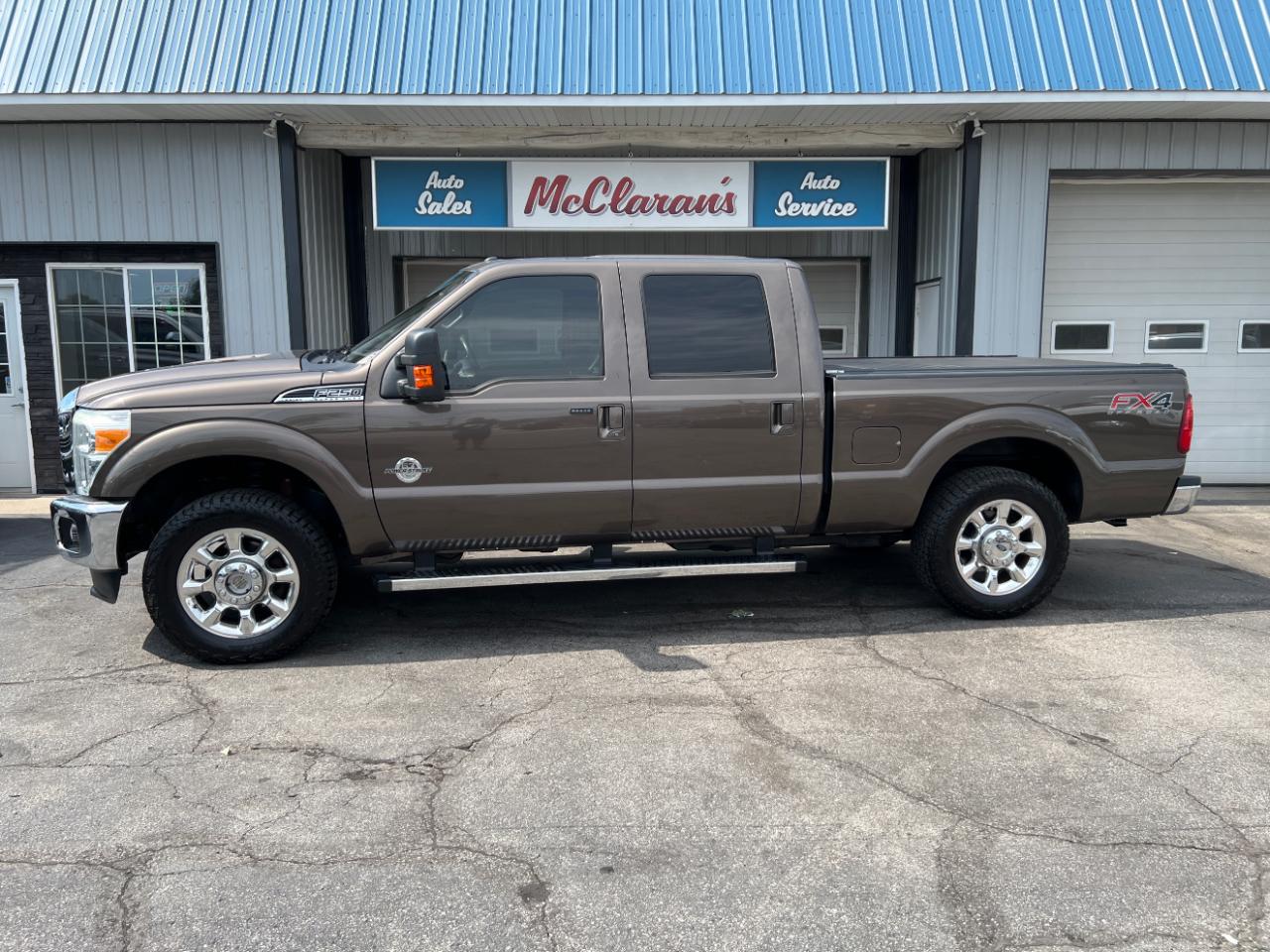 Brown 2015 Ford F-250 Super Duty Pickup Truck Four-Wheel Drive Automatic