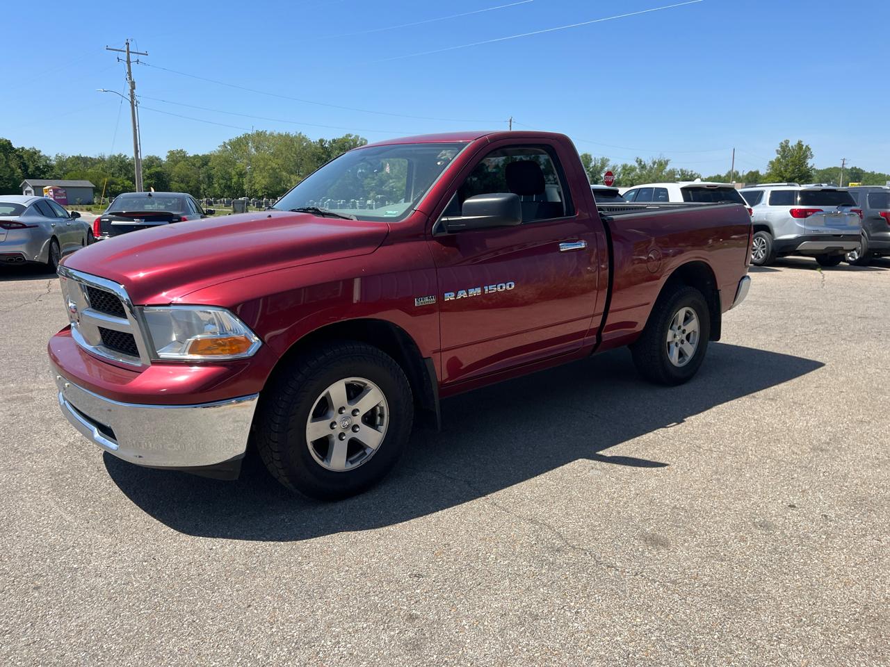 RAM 1500 4WD Reg Cab 120.5" SLT 2011