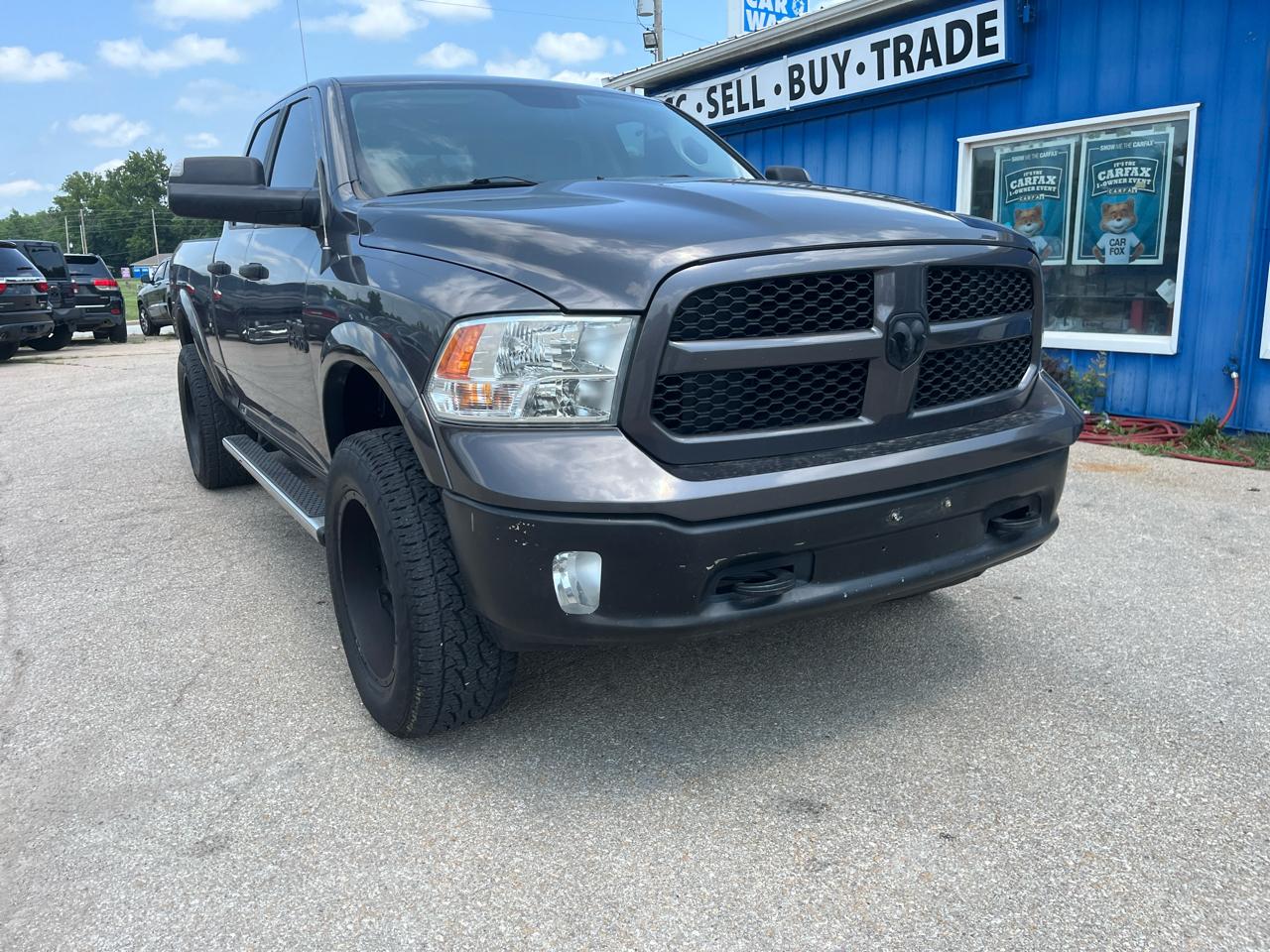 RAM 1500 4WD Quad Cab 140.5" Outdoorsman 2017
