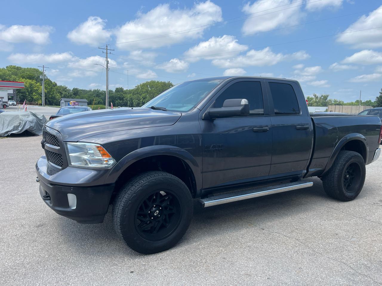 RAM 1500 4WD Quad Cab 140.5" Outdoorsman 2017