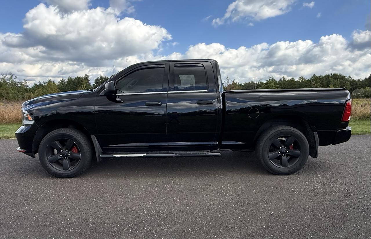 RAM 1500 4WD Quad Cab 140.5" Express 2014