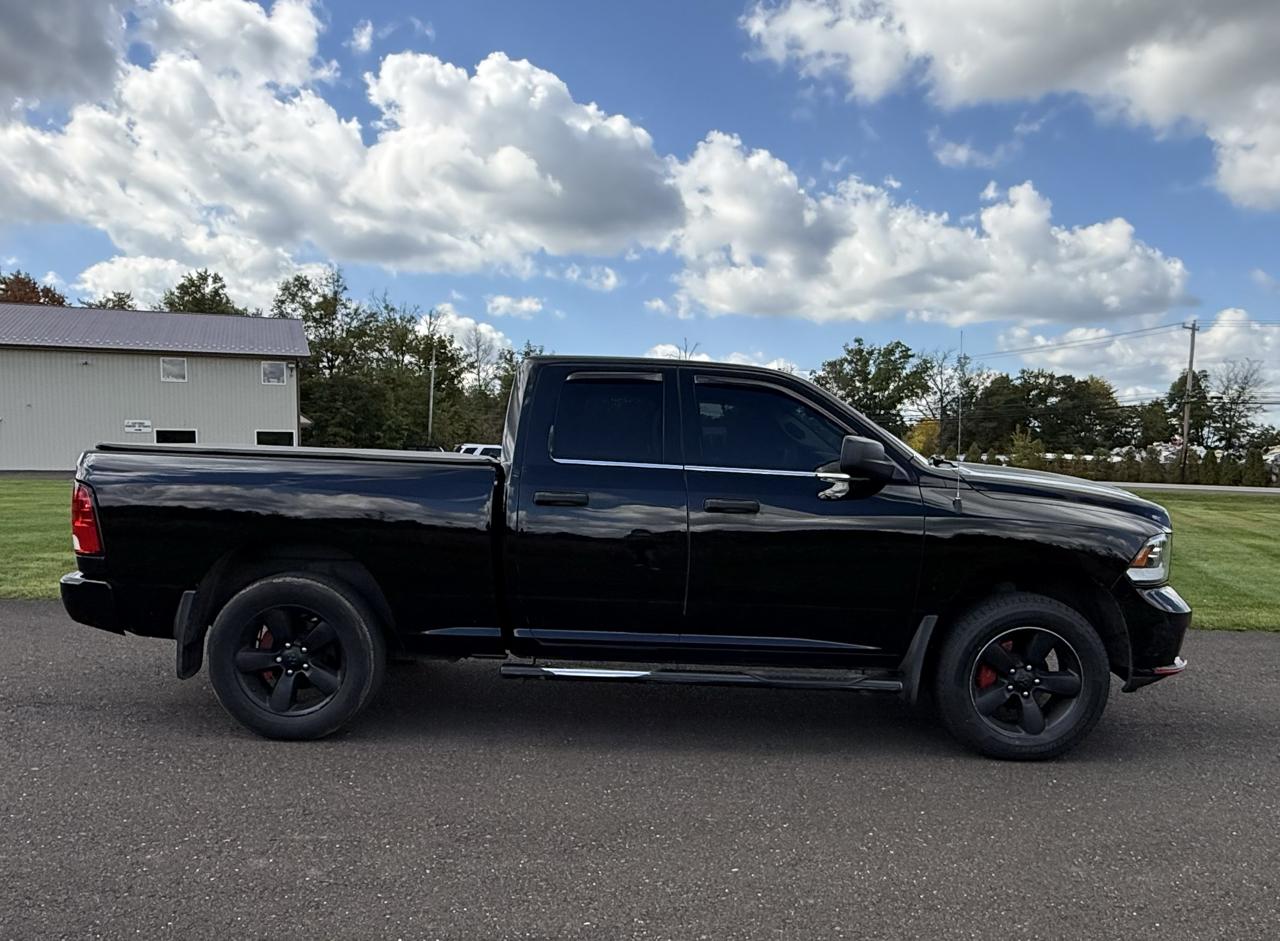 RAM 1500 4WD Quad Cab 140.5" Express 2014