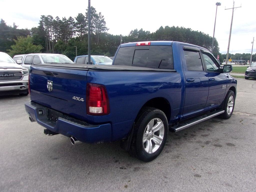 RAM 1500 4WD Crew Cab 140.5" Sport 2016