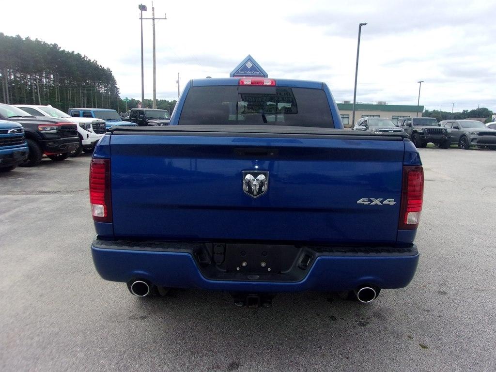 RAM 1500 4WD Crew Cab 140.5" Sport 2016