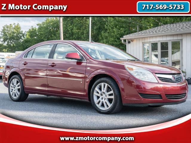 Red 2007 Saturn Aura XE Sedan Front-Wheel Drive Automatic