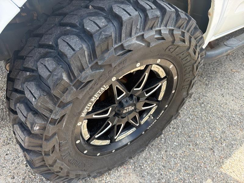Nissan Frontier LE Crew Cab 4WD 2010