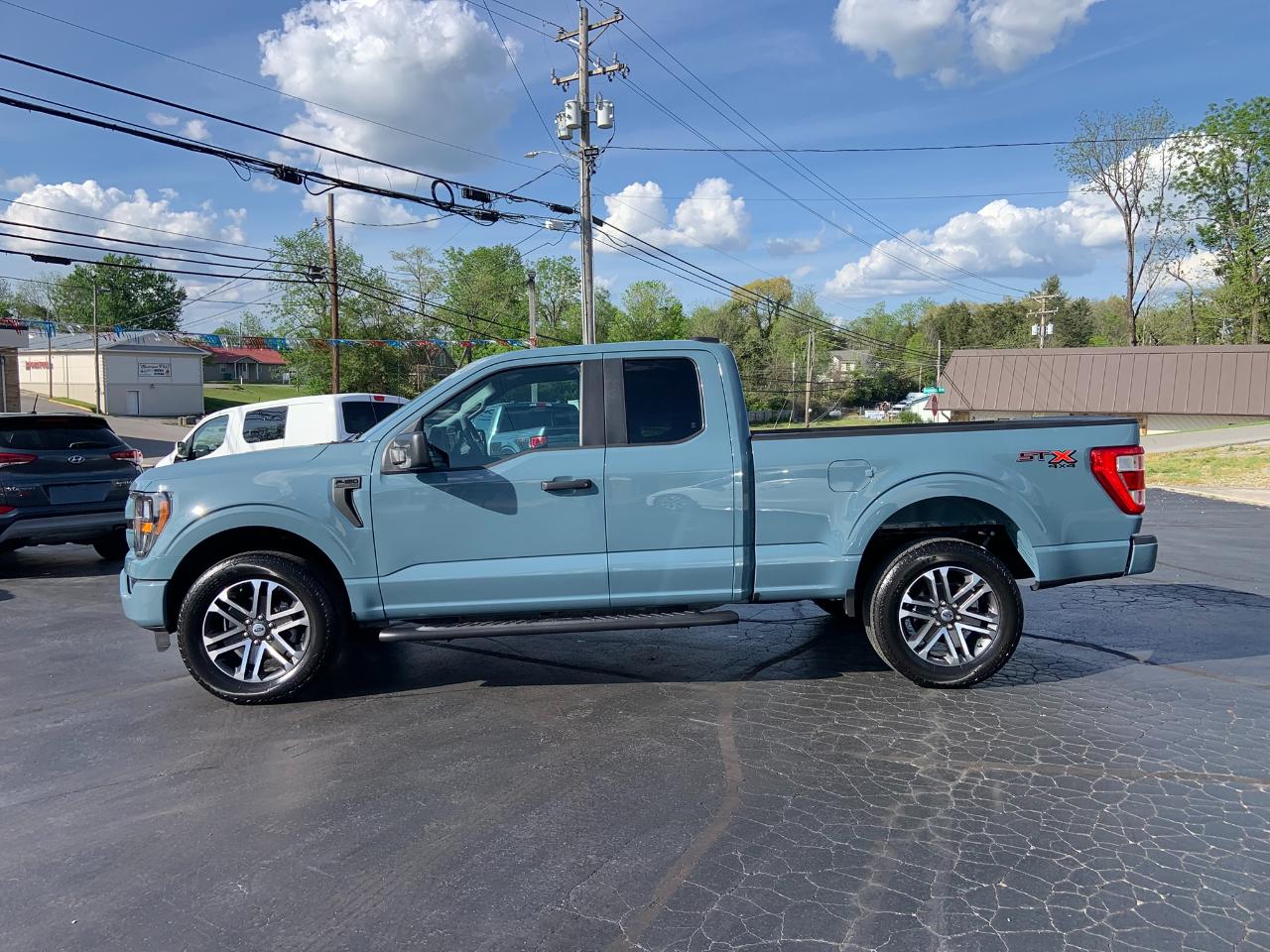Ford F-150 XLT 4WD SuperCab 8' Box 2023
