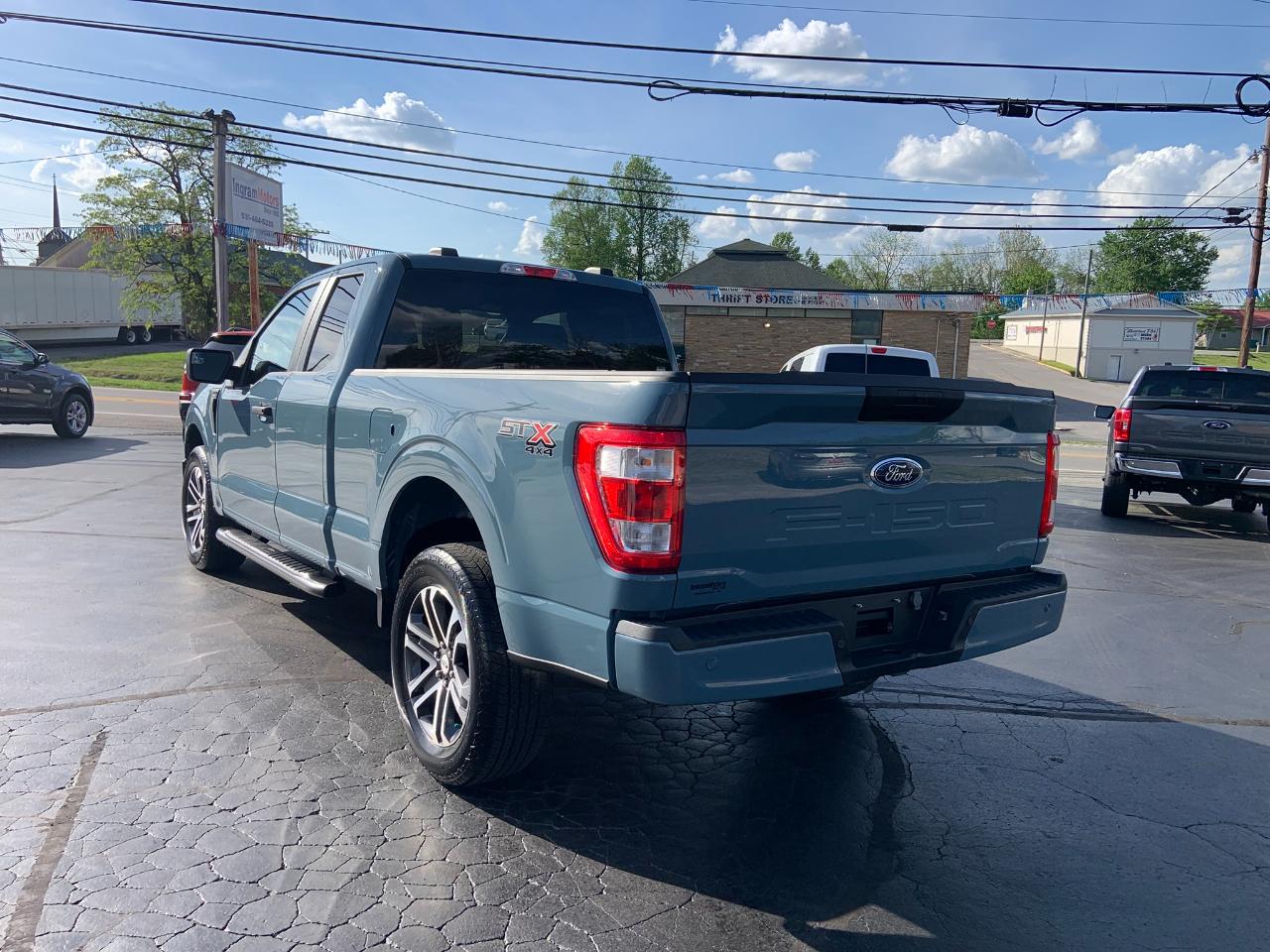 Ford F-150 XLT 4WD SuperCab 8' Box 2023