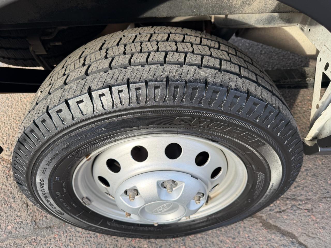 Ford Transit Cargo Van T-150 148" Low Rf 8670 GVWR AWD 2021