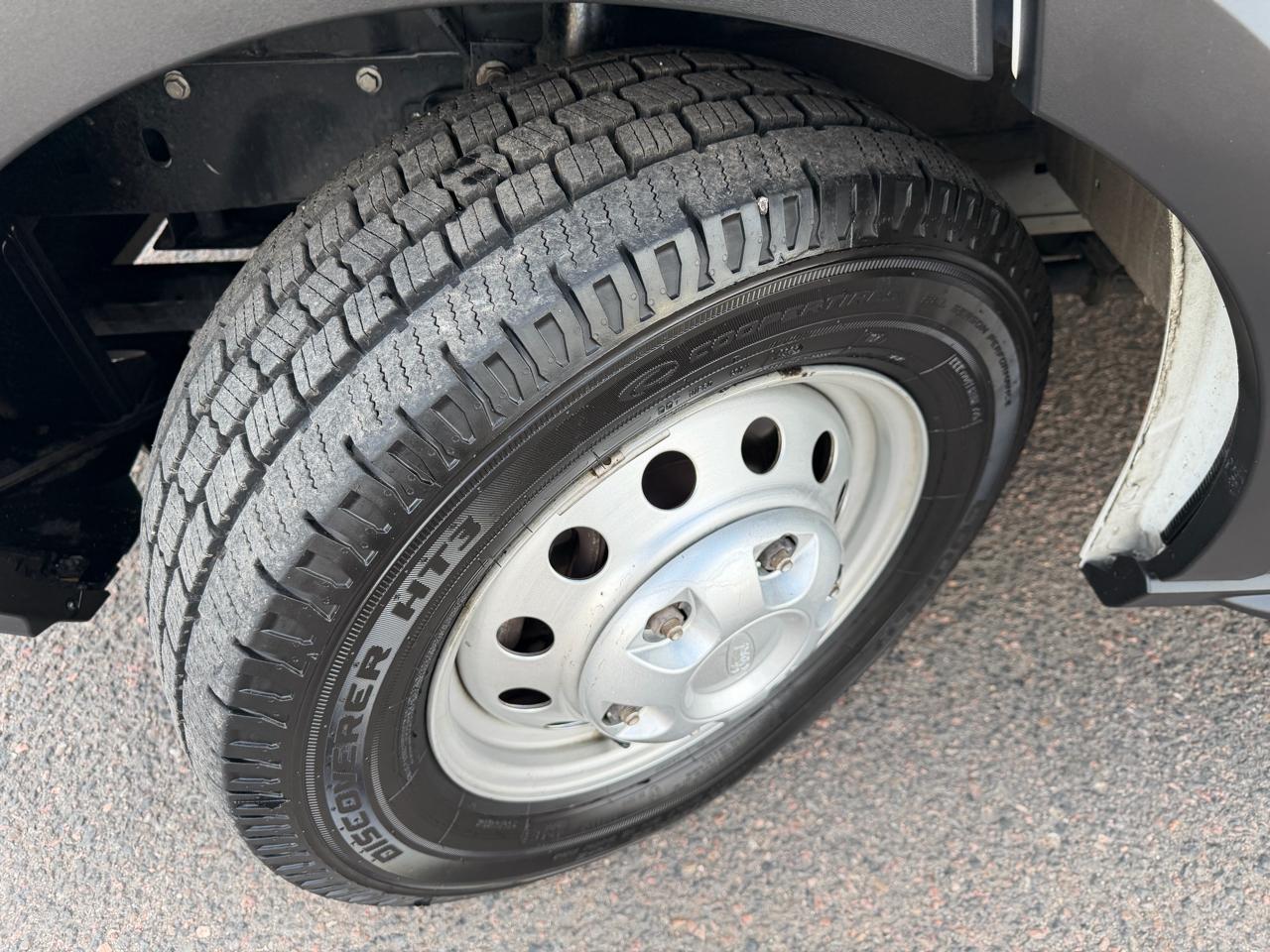 Ford Transit Cargo Van T-150 148" Low Rf 8670 GVWR AWD 2021