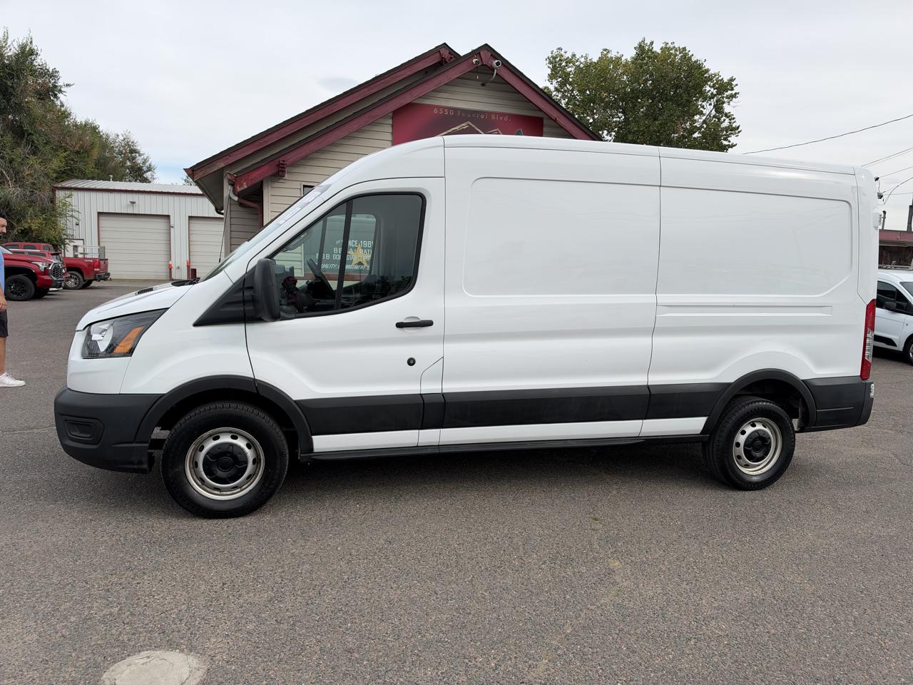 Ford Transit Cargo Van T-150 148" Med Rf 8670 GVWR RWD 2023