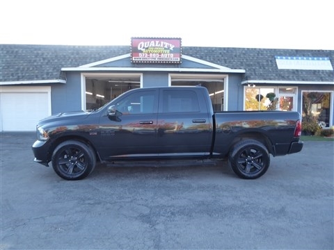 2015 RAM 1500 4WD Crew Cab 140.5" Sport