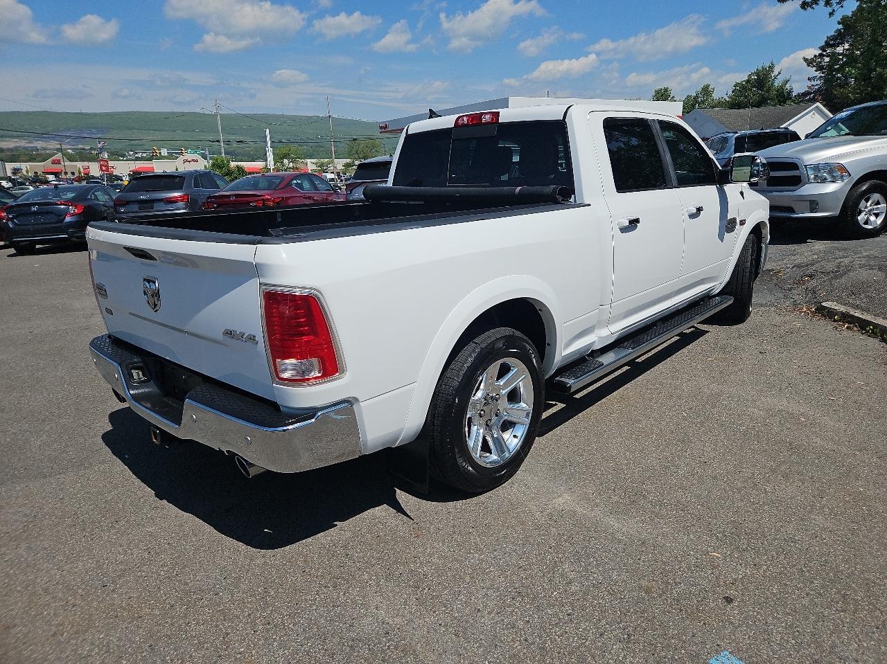 RAM 1500 4WD Crew Cab 149" Laramie Longhorn 2015