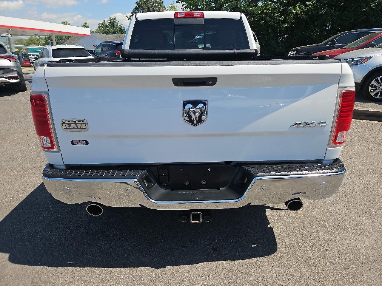 RAM 1500 4WD Crew Cab 149" Laramie Longhorn 2015