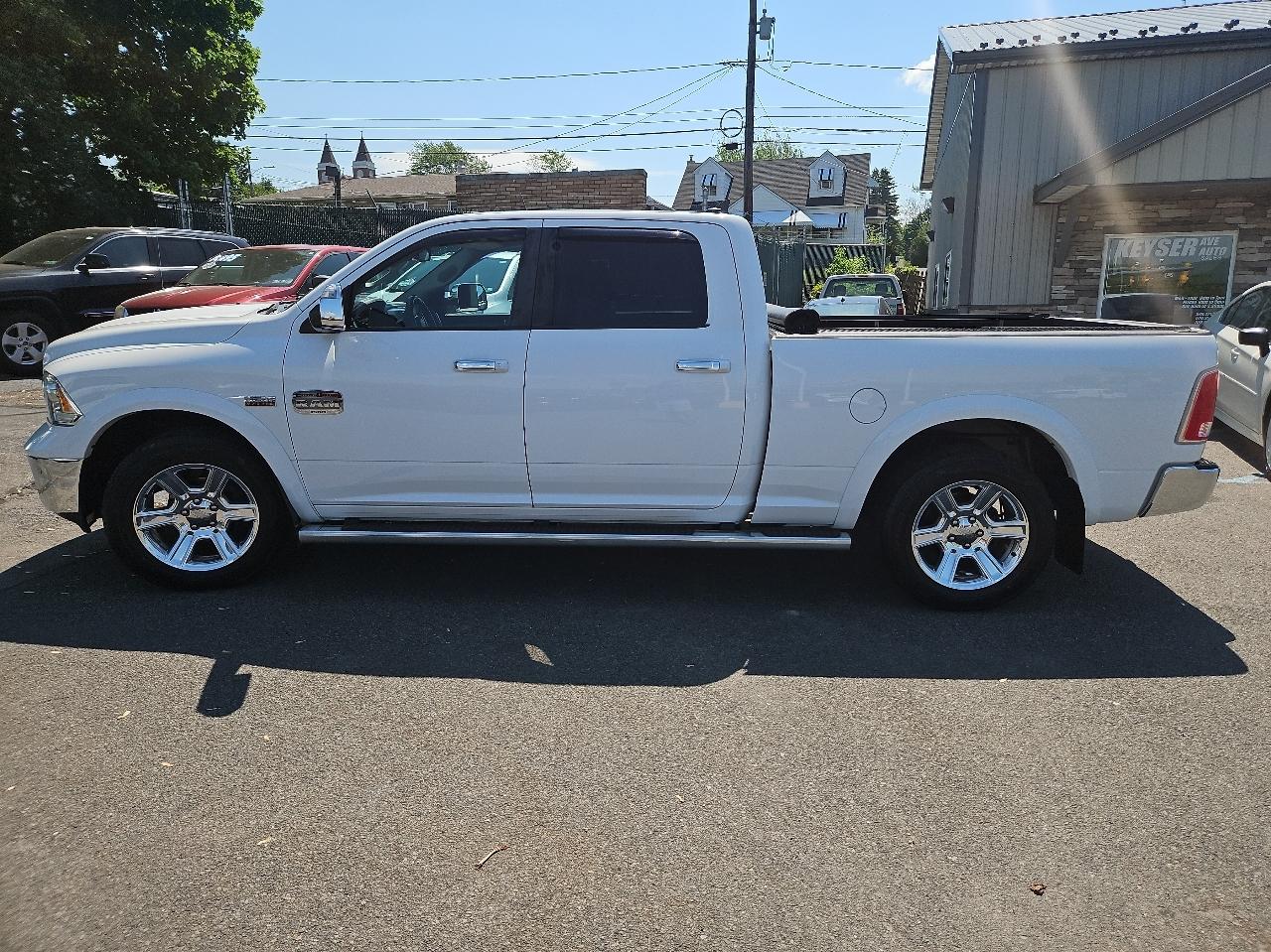 RAM 1500 4WD Crew Cab 149" Laramie Longhorn 2015