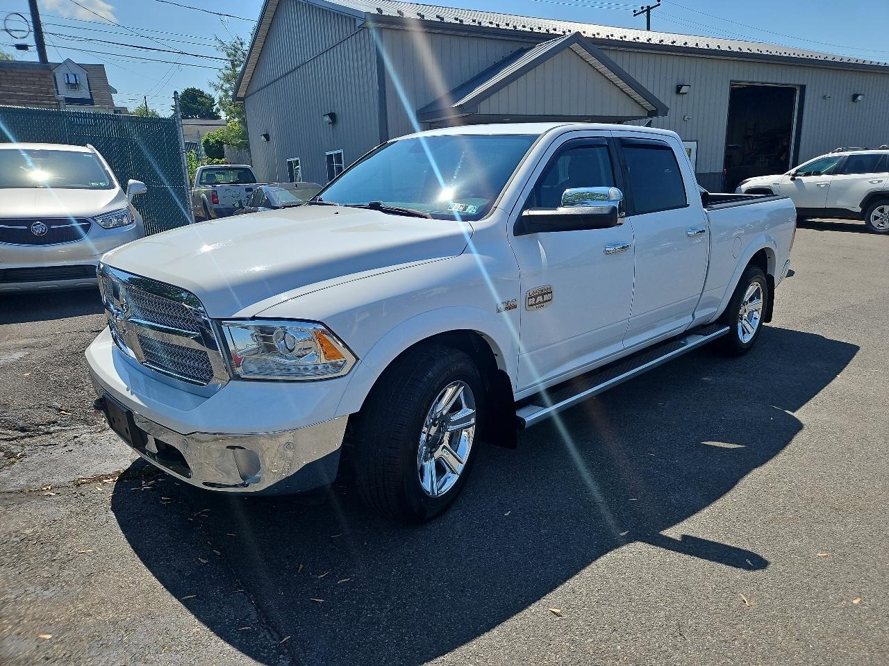 RAM 1500 4WD Crew Cab 149" Laramie Longhorn 2015