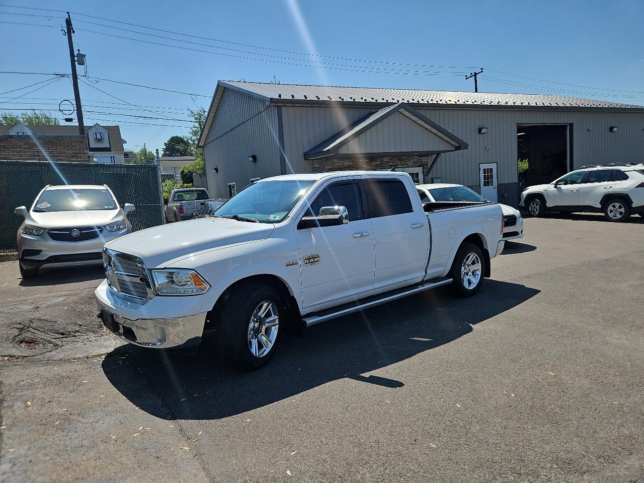 RAM 1500 4WD Crew Cab 149" Laramie Longhorn 2015