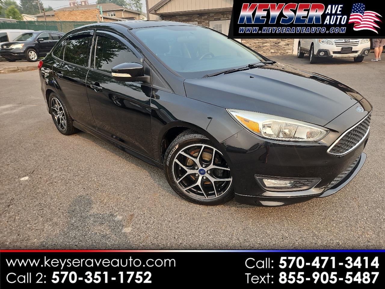Black 2015 Ford Focus Sedan Front-Wheel Drive Automatic