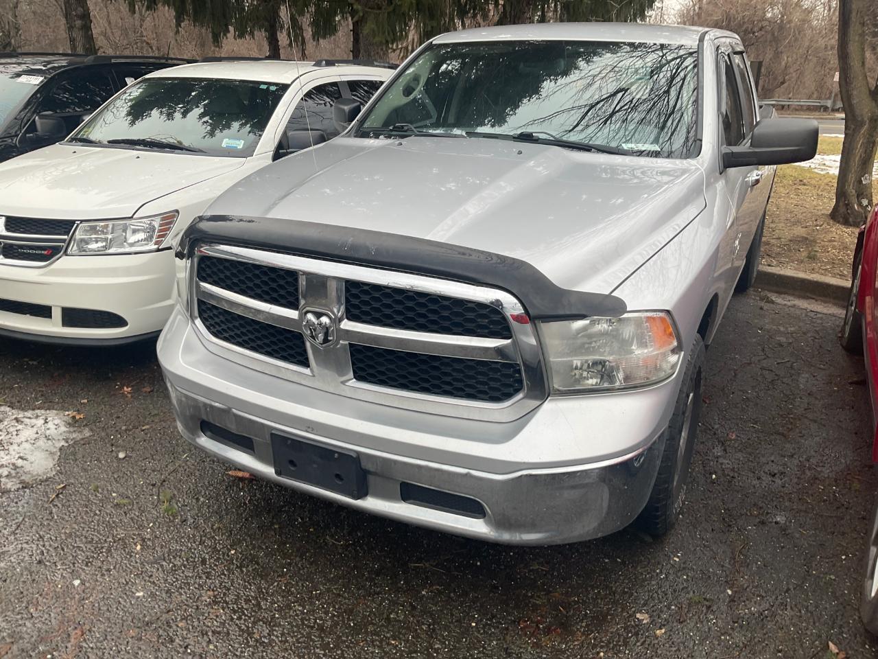 RAM 1500 4WD Quad Cab 140.5" SLT 2013