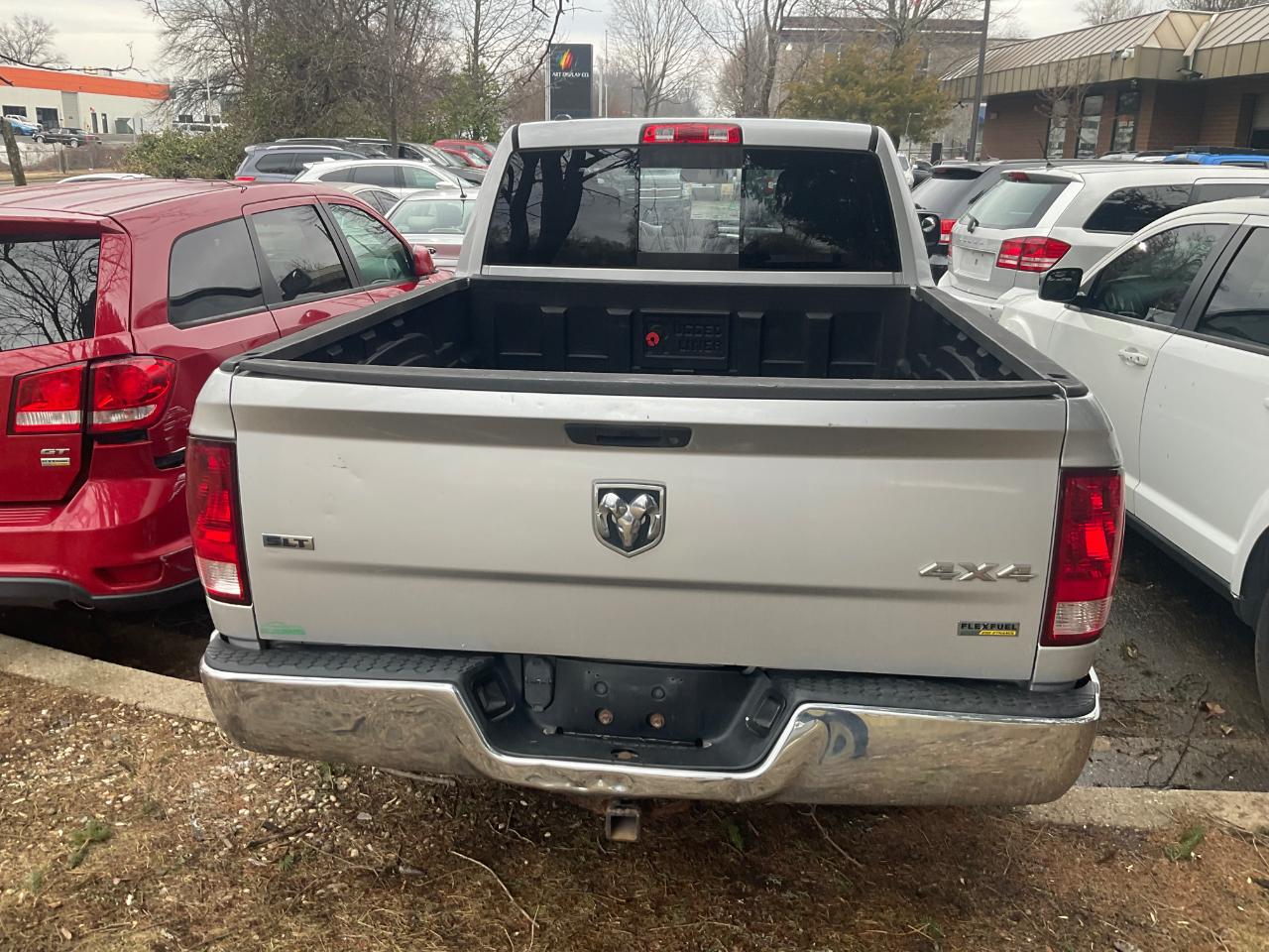 RAM 1500 4WD Quad Cab 140.5" SLT 2013