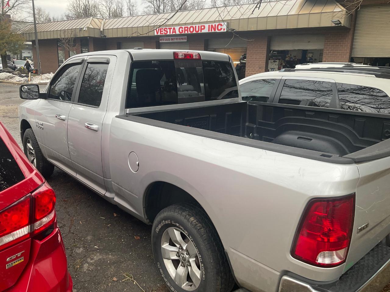 RAM 1500 4WD Quad Cab 140.5" SLT 2013