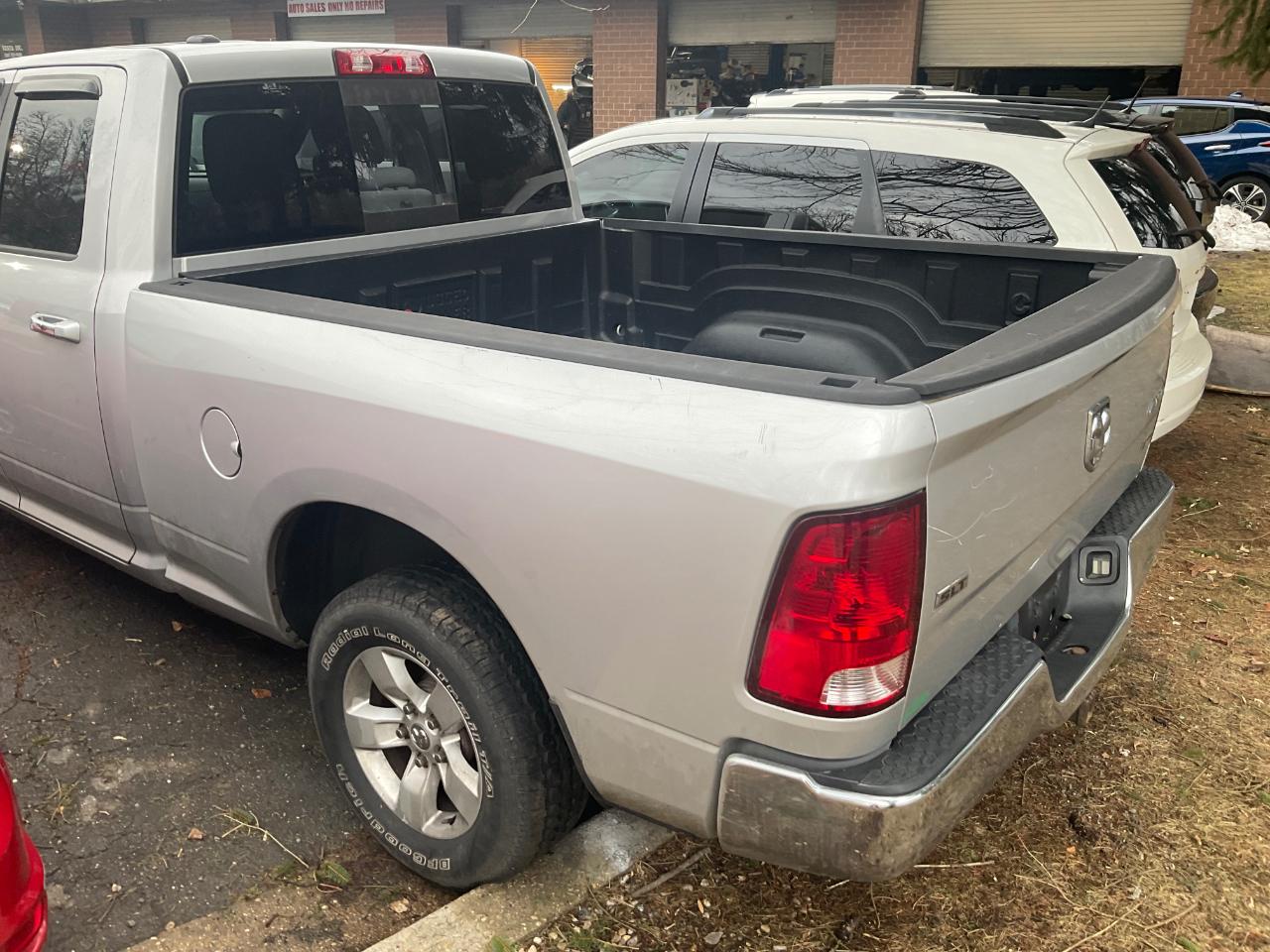RAM 1500 4WD Quad Cab 140.5" SLT 2013