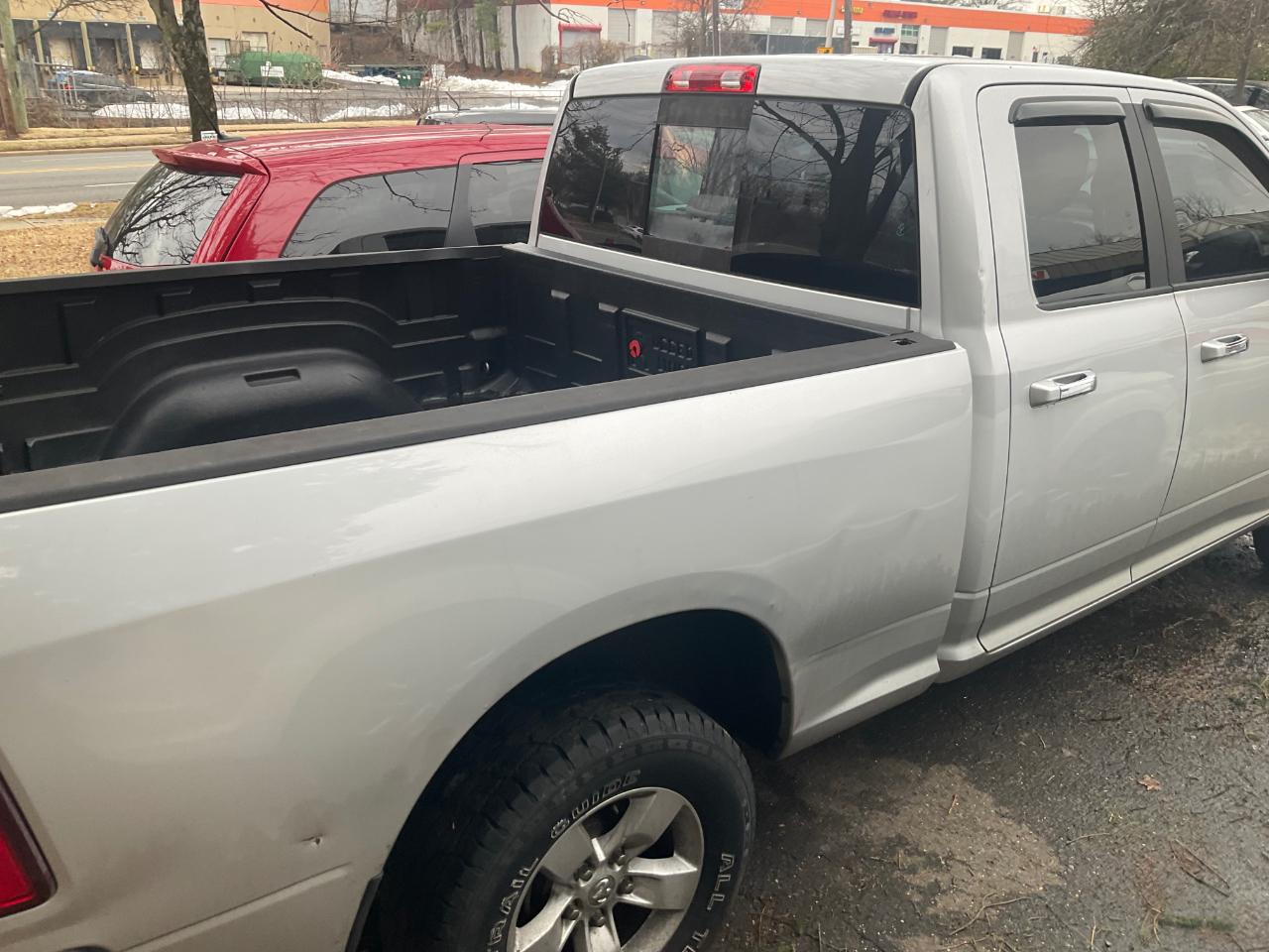 RAM 1500 4WD Quad Cab 140.5" SLT 2013