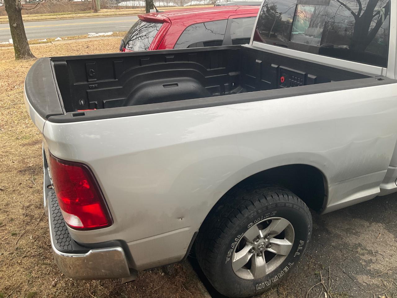 RAM 1500 4WD Quad Cab 140.5" SLT 2013