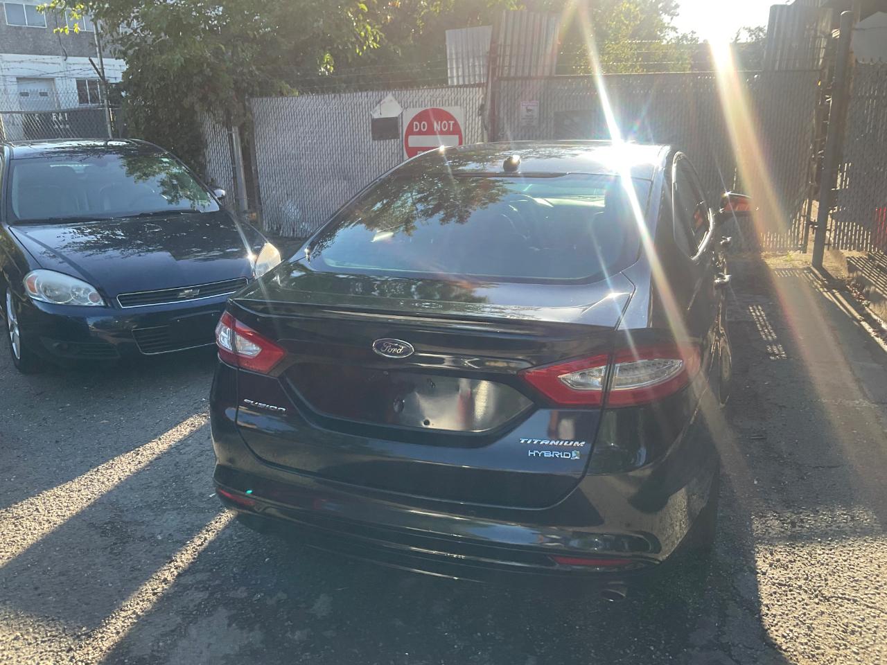 Ford Fusion 4dr Sdn Titanium Hybrid FWD 2014