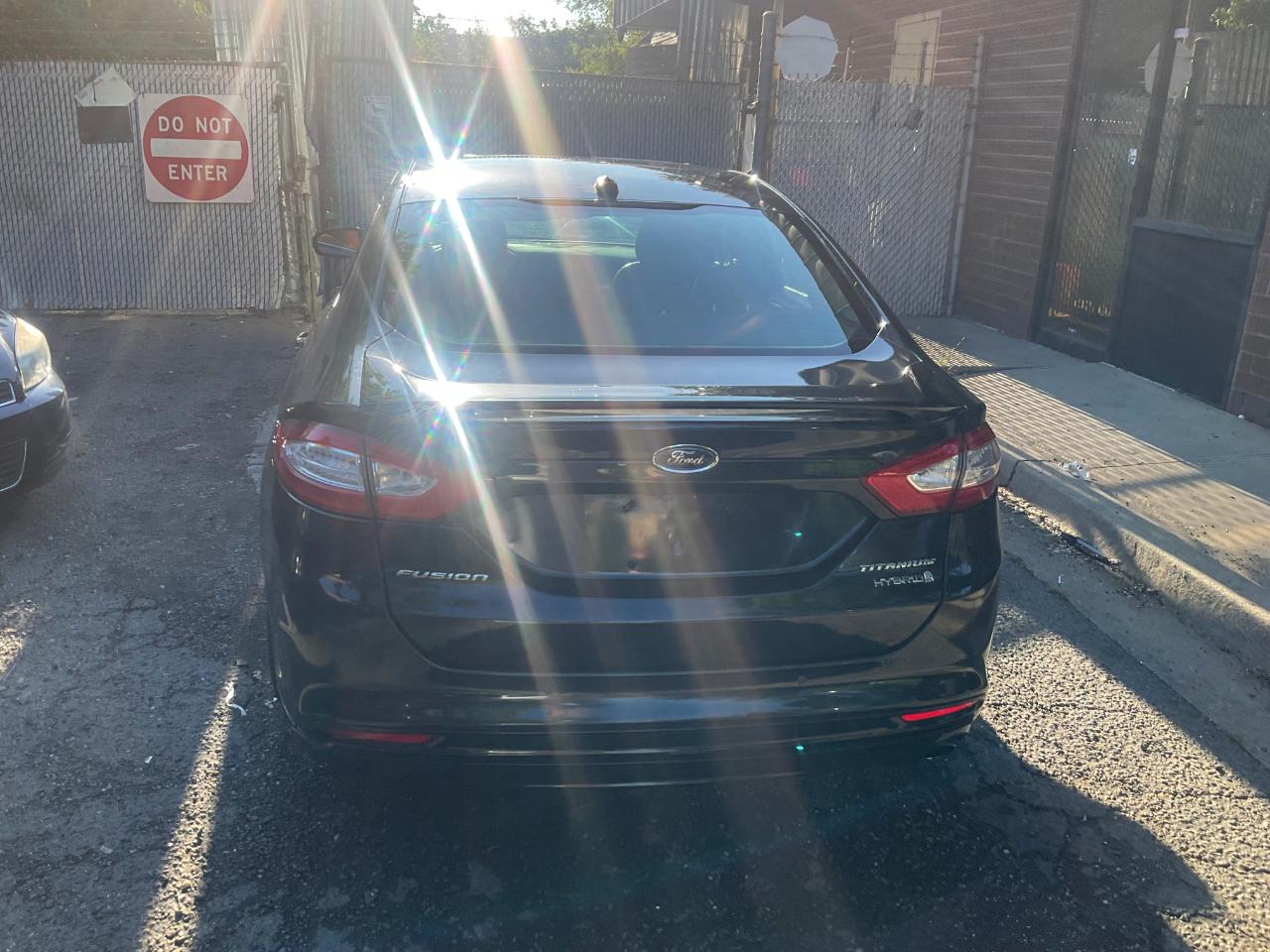 Ford Fusion 4dr Sdn Titanium Hybrid FWD 2014