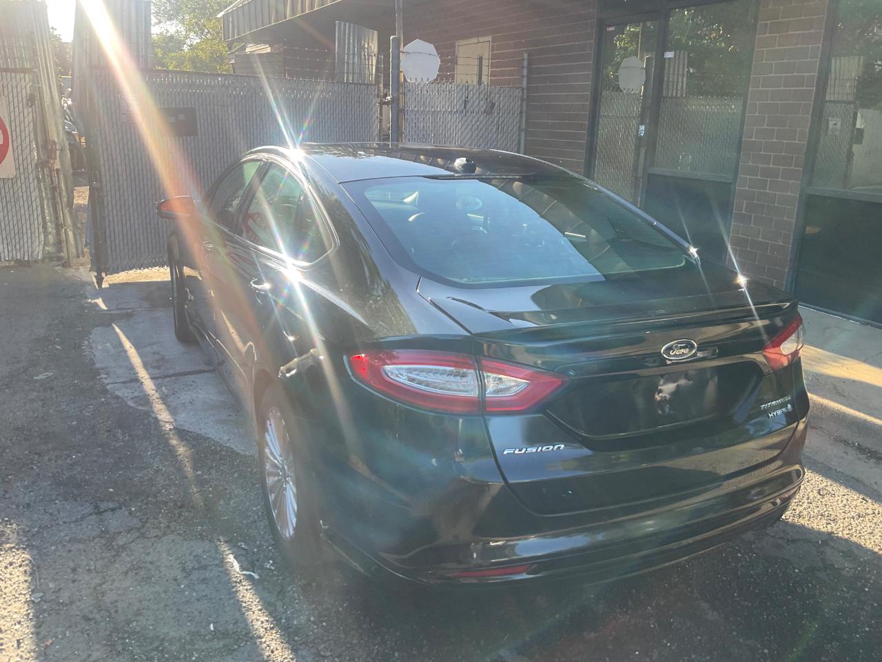 Ford Fusion 4dr Sdn Titanium Hybrid FWD 2014
