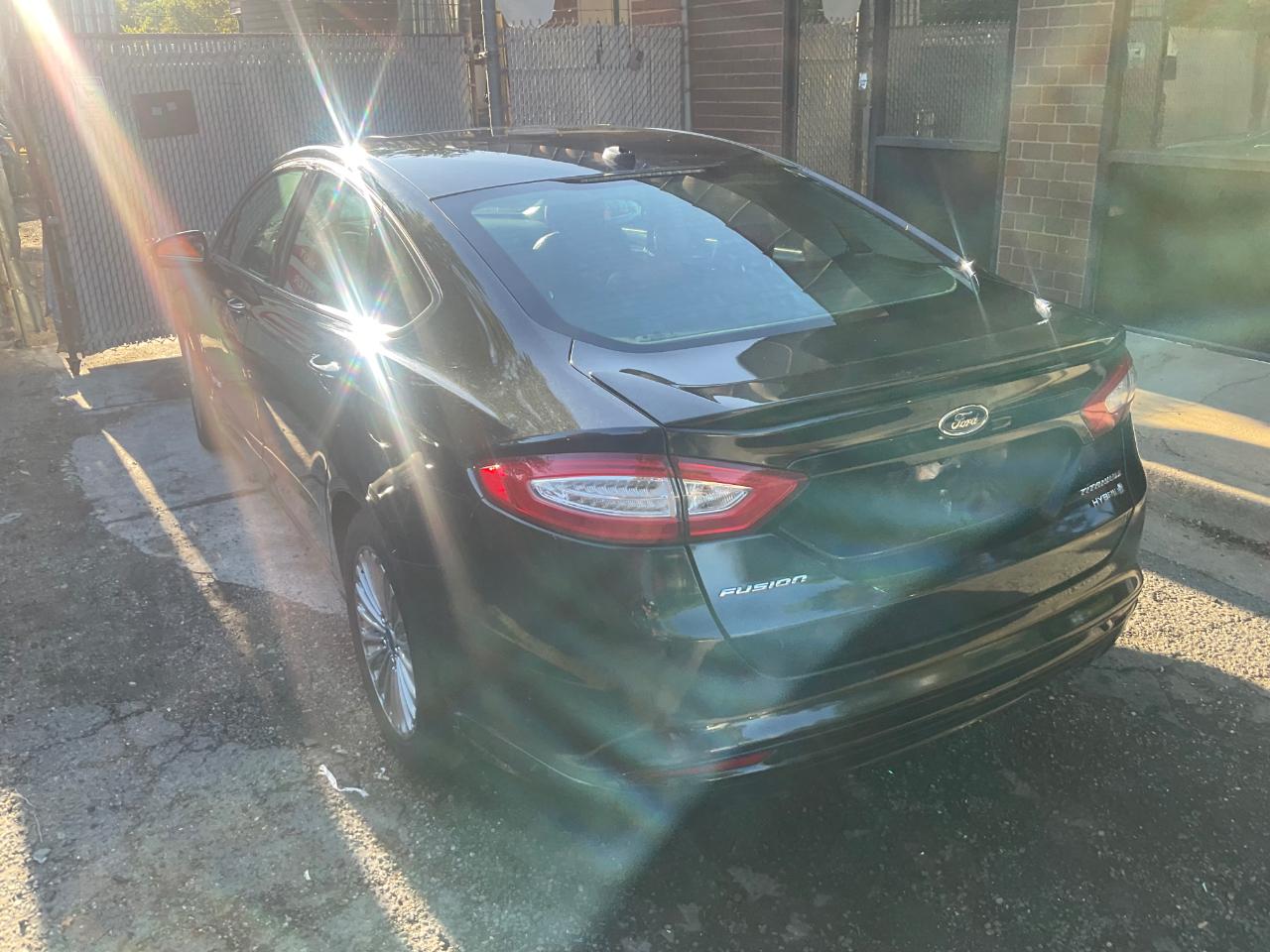 Ford Fusion 4dr Sdn Titanium Hybrid FWD 2014