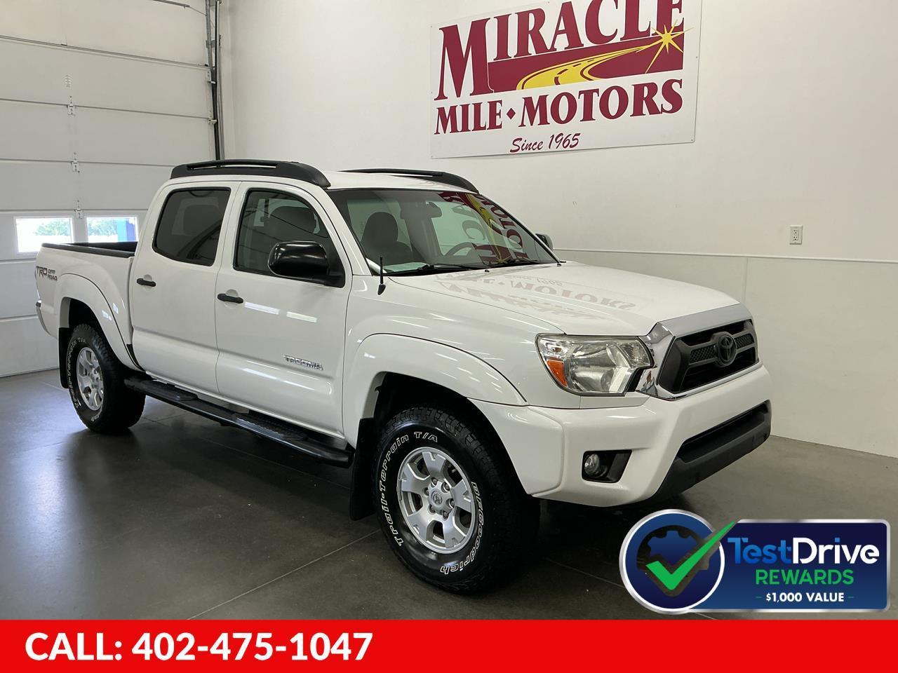 White 2015 Toyota Tacoma Pickup Truck Four-Wheel Drive 5-Speed Automatic
