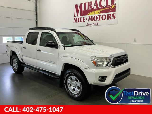 White 2015 Toyota Tacoma Pickup Truck Four-Wheel Drive 5-Speed Automatic