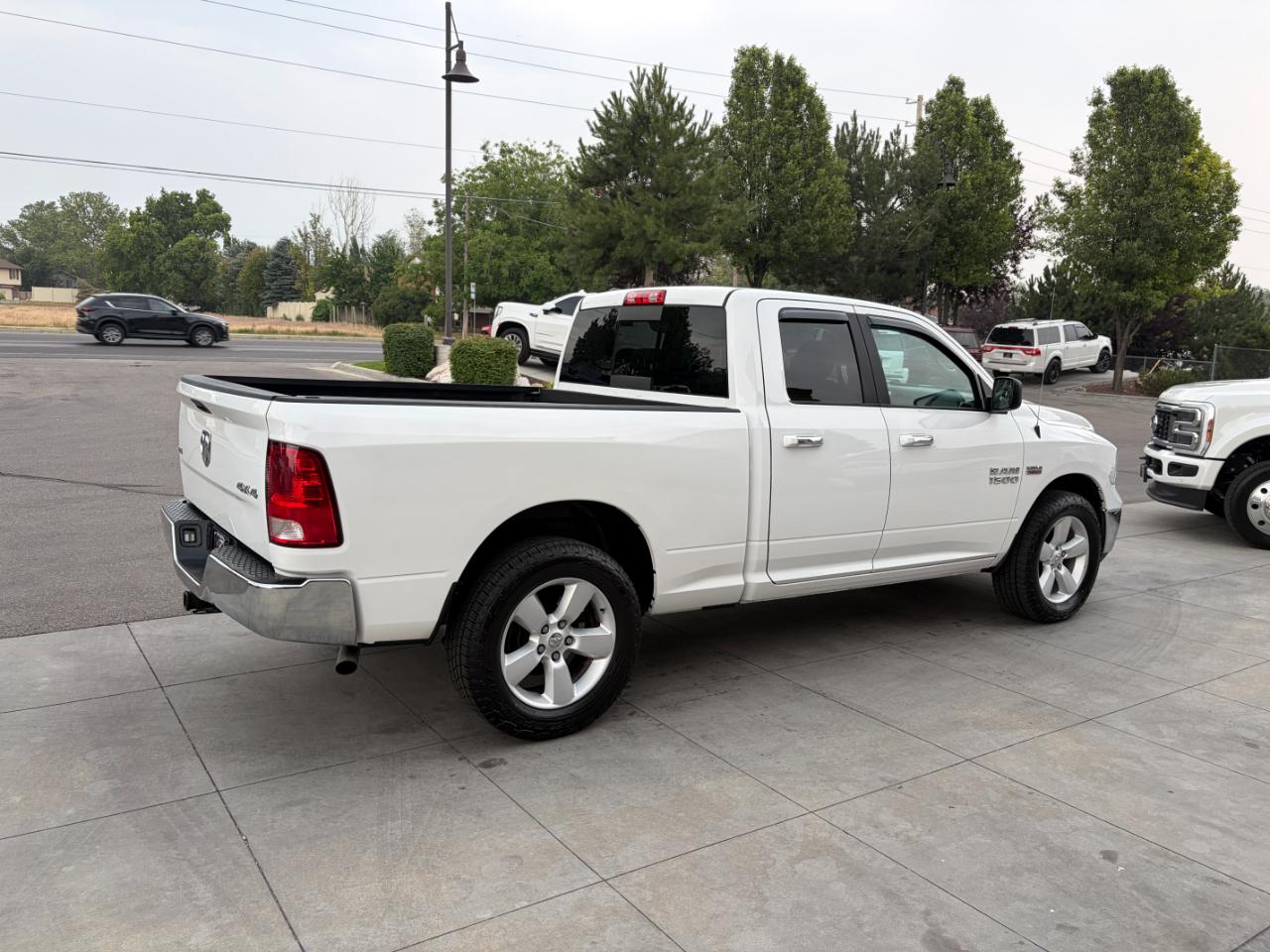 RAM 1500 4WD Quad Cab 140.5" SLT 2017