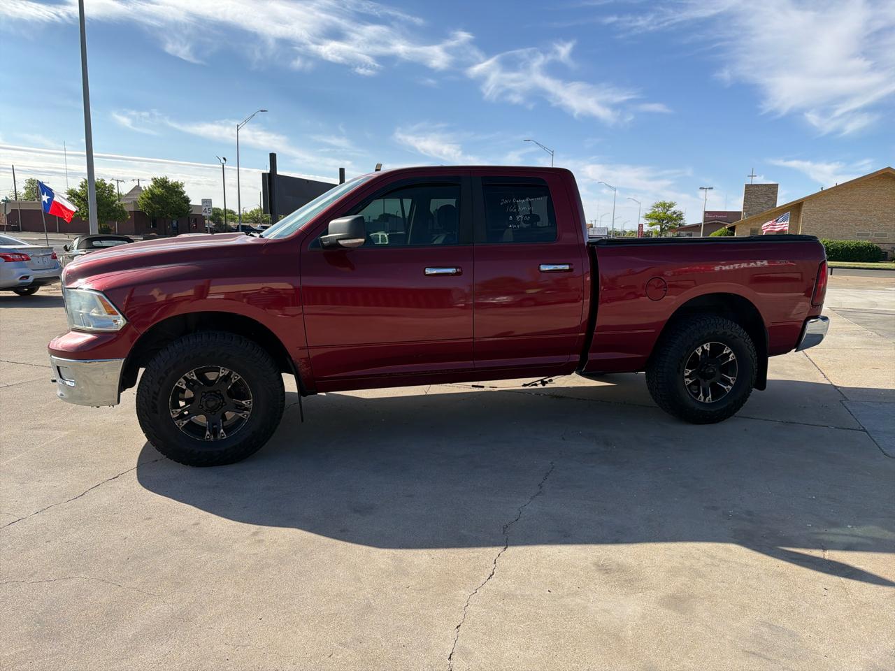 RAM 1500 4WD Quad Cab 140.5" SLT 2011