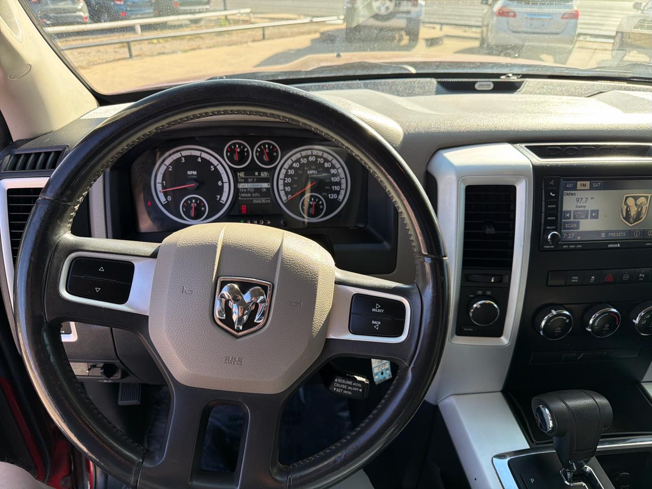 RAM 1500 4WD Quad Cab 140.5" SLT 2011