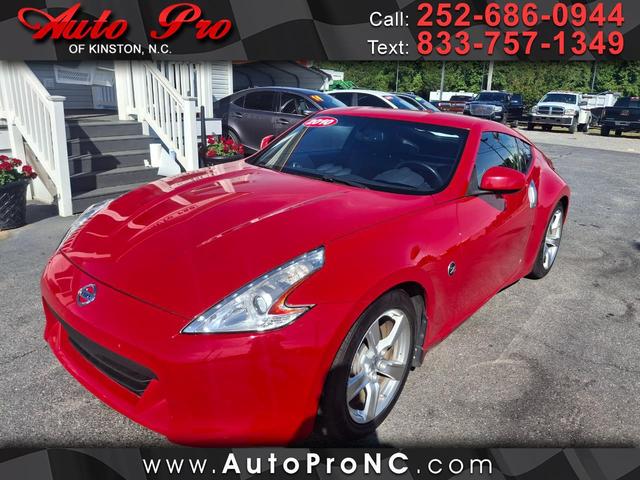 Red 2010 Nissan 370Z Touring Coupe Rear-Wheel Drive Manual